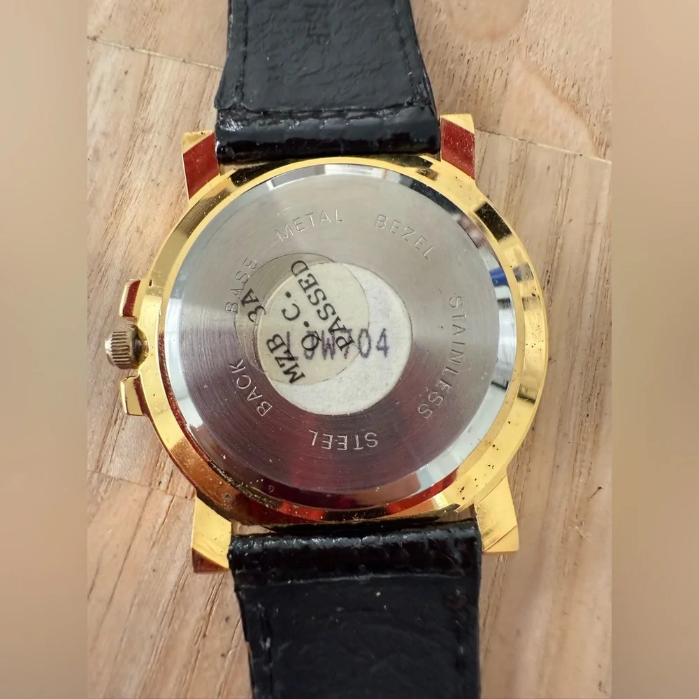 Vintage John weitz gold tone black leather watch NEW BATTERY
